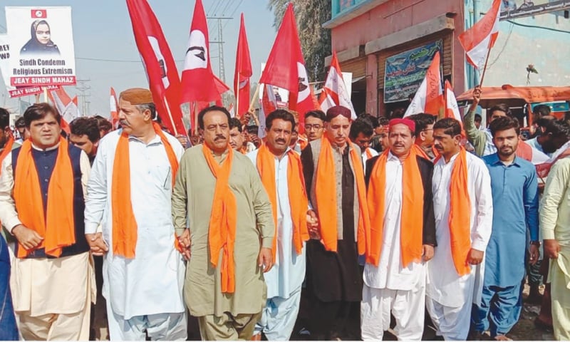 ACTIVISTS of Hindu organisations, Rawadari Tehreek and civil society organisations hold a rally in Jacobabad.