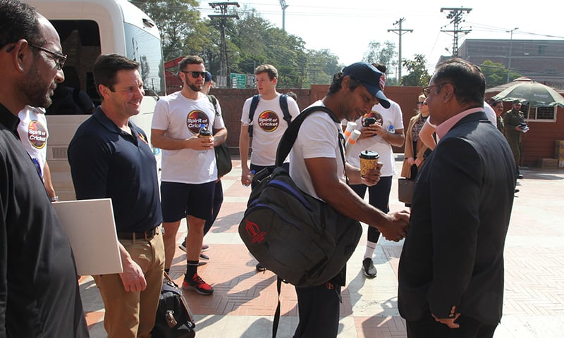 MCC captain Kumar Sangakkara shakes hands with a PCB official after the team's arrival in Lahore on February 13. — Photo courtesy PCB