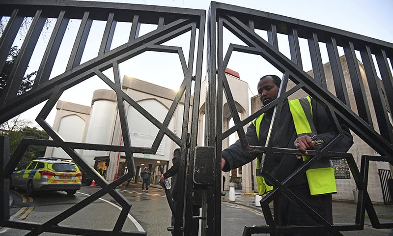 Security and police outside London Central Mosque in Regent's Park, where police have arrested a man on suspicion of attempted murder, in London, Thursday, Feb 20. — AP