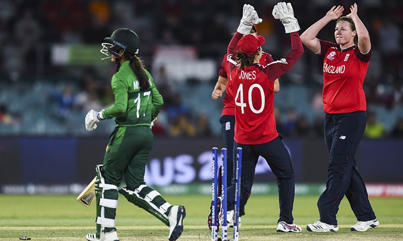 England's Anya Shrubsole, pictured right, celebrates with teammates after claiming the wicket of Muneeba Ali Siddiqui of Pakistan during their Women's T20 World Cup match in Canberra, Australia on Friday. — AP