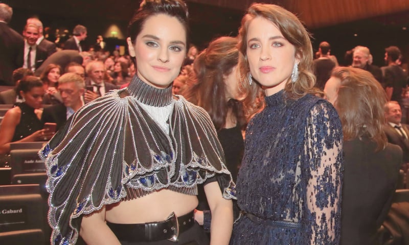 PARIS: Noemie Merlant (left) and Adele Haene pose for photographers during the Cesar Award ceremony after being awarded for the Best Film with ‘Les Miserables’ on Friday. The two actresses walk out of ceremony after Roman Polanski won Best Director for ‘An Officer and a Spy’.—AP