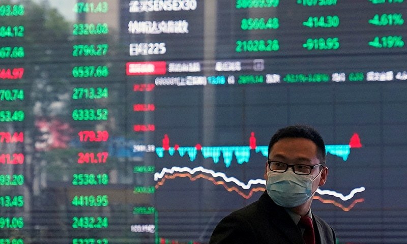 A man wearing a protective mask is seen inside the Shanghai Stock Exchange building, as the country is hit by a new coronavirus outbreak, at the Pudong financial district in Shanghai, China on February 28. — Reuters/File A man wearing a protective mask is seen inside the Shanghai Stock Exchange building, as the country is hit by a new coronavirus outbreak, at the Pudong financial district in Shanghai, China on February 28. — Reuters/File