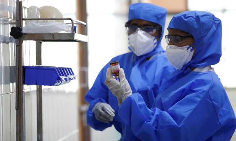 Medical staff with protective clothing are seen inside a coronavirus ward at the Rajiv Ghandhi Government General hospital in Chennai on Jan 29. — Reuters