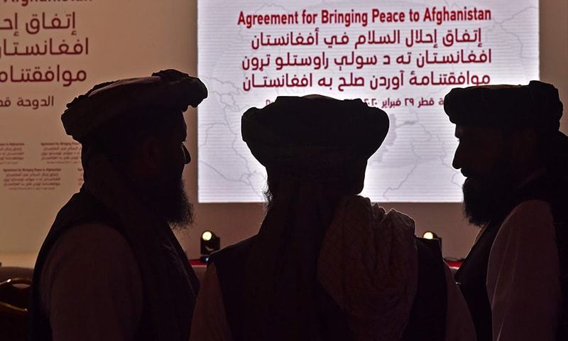 Members of the Taliban delegation gather ahead of the signing ceremony with the United States in the Qatari capital Doha, on February 29. — AFP/File