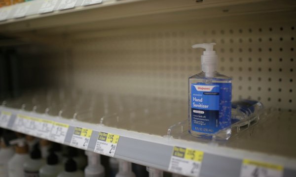 Surgical masks, sanitisers wiped off shelves as people fight to feel in control amid virus fears. — AP Surgical masks, sanitisers wiped off shelves as people fight to feel in control amid virus fears. — AP