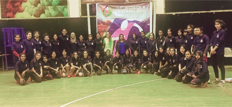 ISLAMABAD: Participants pose at the end of an indoor football event organised by the PFF Normalisation Committee to celebrate women&rsquo;s day on Sunday.