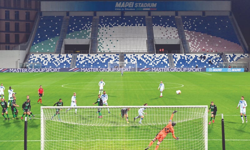 A VIEW of the empty stands at the Mapei stadium as the Serie A match between Sassuolo and Brescia is being played behind closed doors, in Reggio Emilia.—AP