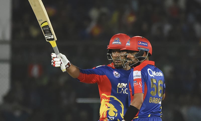 Sharjeel Khan of Karachi Kings acknowledges his fifty with partner Babar Azam against Lahore Qalandars during the Pakistan Super League at the National Stadium, Karachi. — AP