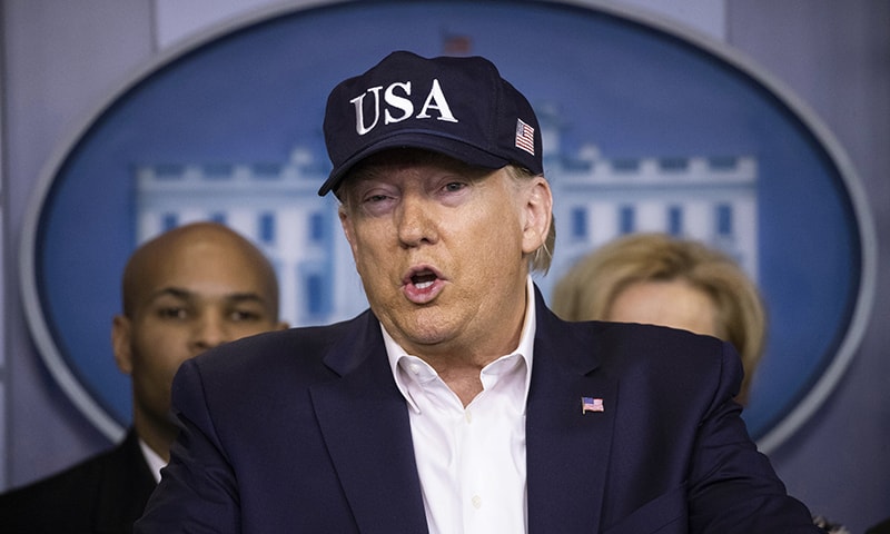 President Donald Trump speaks during a news conference about the coronavirus at the White House on Saturday. — AP