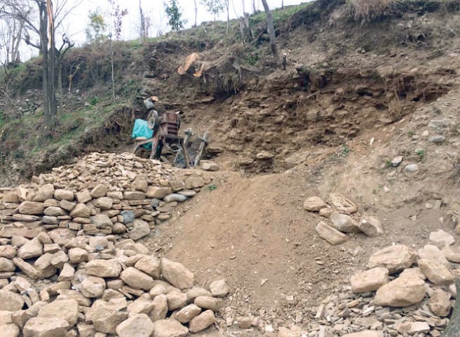 A view of the archaeological site dug up by the landowners. — Dawn
