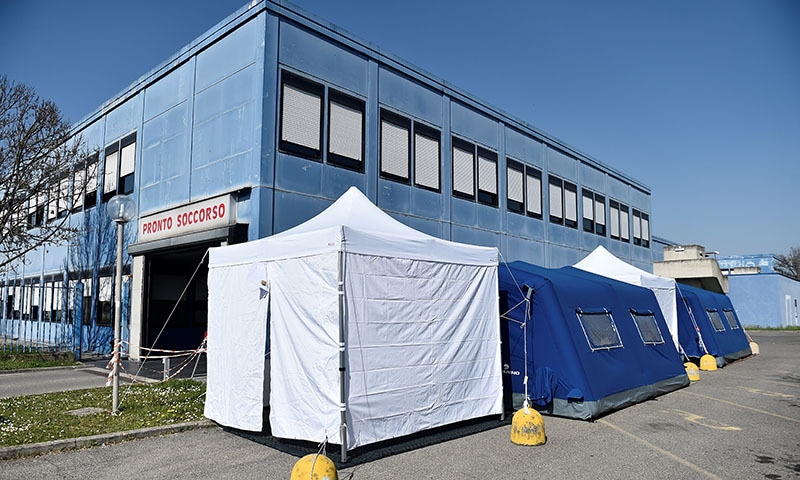 Tents are set up outside of the Oglio Po hospital, where patients suffering from coronavirus disease (COVID-19) are treated, in Cremona, Italy, on March 19, 2020. — Reuters