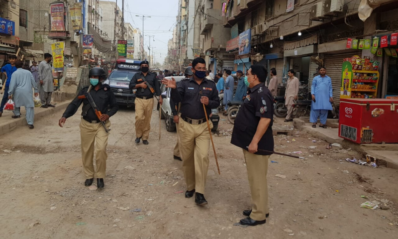 Officers of the Baghdadi police station out on the streets to inform people about the impending lockdown. &mdash;Police sources