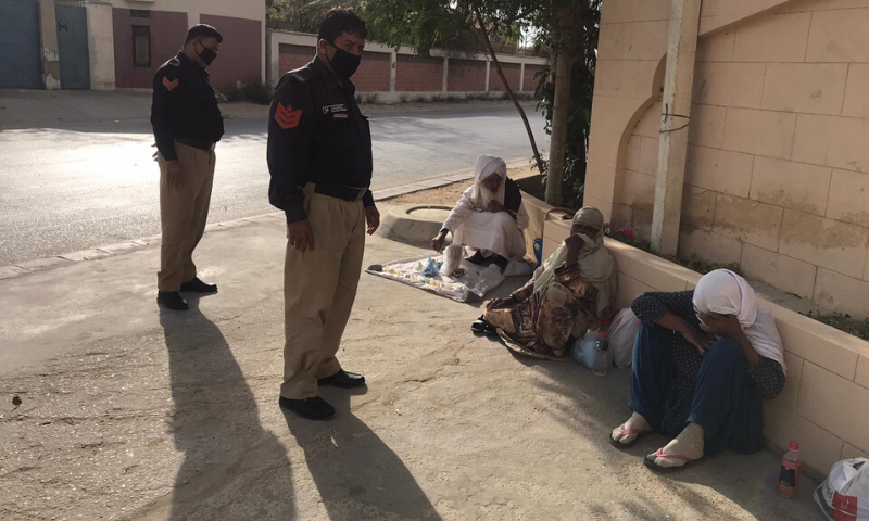 Darakshan police station officers telling people to go to their homes. &mdash;Police sources