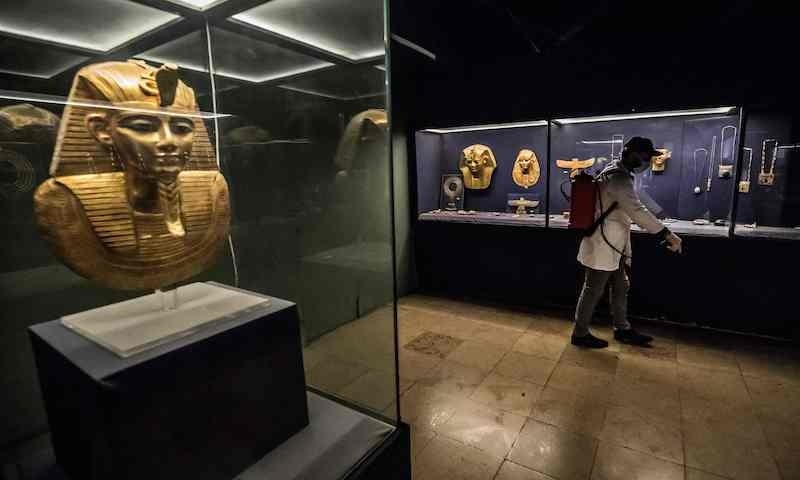 A worker disinfects a room of the Egyptian Museum in Cairo's landmark Tahrir Square amid the coronavirus pandemic, on March 23, 2020. &mdash; AFP