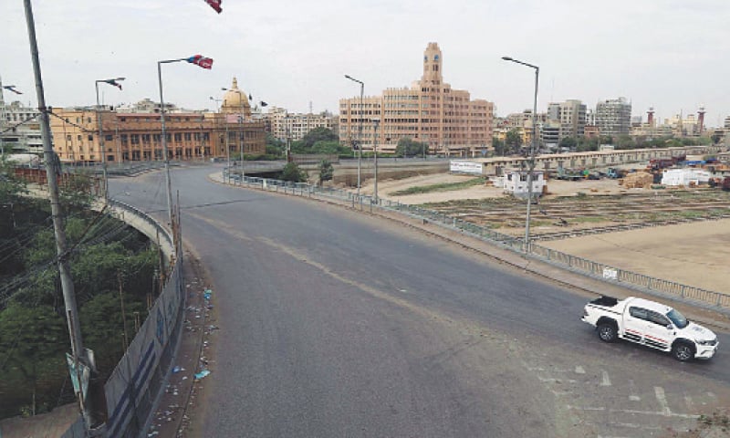 Karachi Port Trust building and Customs House, usually bustling with activity, were deserted on Monday as the lockdown began. Docking and loading of ships at the port continued as normal however.