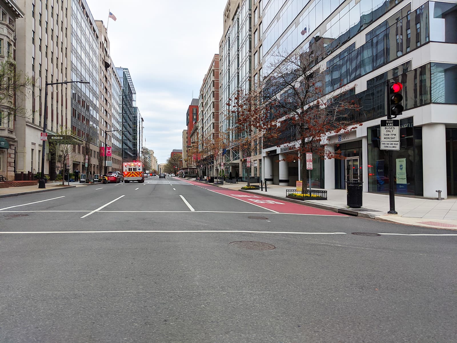 An ambulance occupies a barren street in downtown DC. - Picture by Author