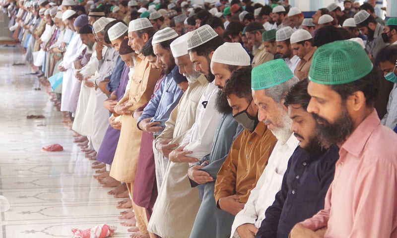 People offer Friday prayers at Memon Masjid.—Online