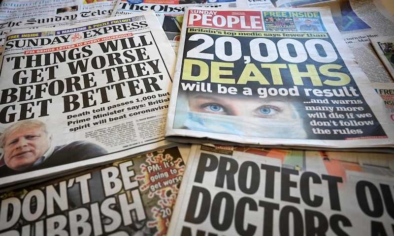 An arrangement of British Sunday newspapers photographed as an illustration in Liverpool, north west England on March 29, 2020, shows the front page stories reporting on Britain's Prime Minister's comments that 'Things will get worse before they get better', as life in Britain continues during the nationwide lockdown to combat the novel coronavirus pandemic. - Prime Minister Boris Johnson warned Saturday the coronavirus outbreak will get worse before it gets better, as the number of deaths in Britain rose 260 in one day to over 1,000. The Conservative leader, who himself tested positive for CO