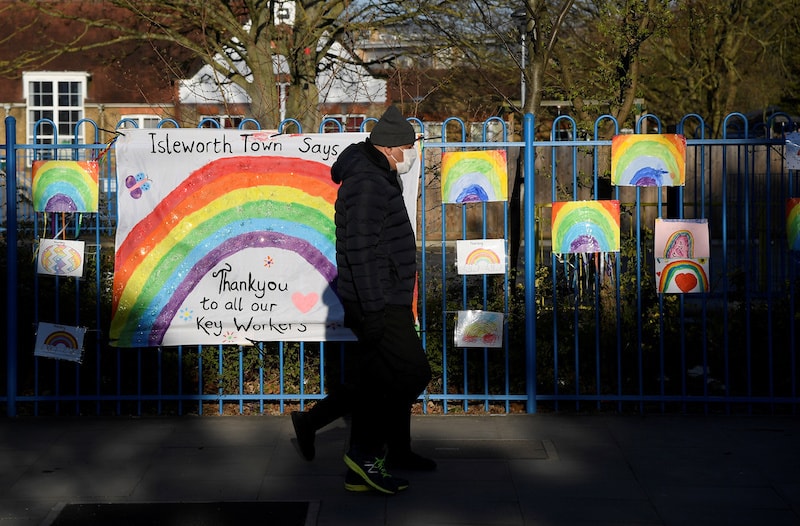 Rainbow messages of support and thanks are seen attached to school railings at Isleworth Town school, as the spread of the coronavirus continues in London, Britain, on April 1, 2020. — Reuters