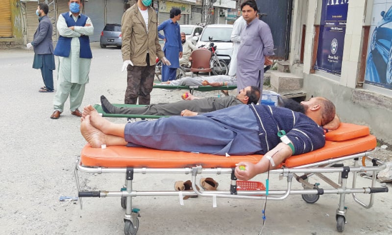 People donate blood in Mingora. — Dawn