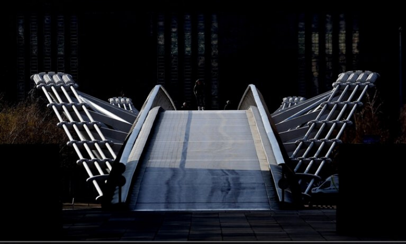 An empty view of the Millenium Bridge in London. &mdash; AP
