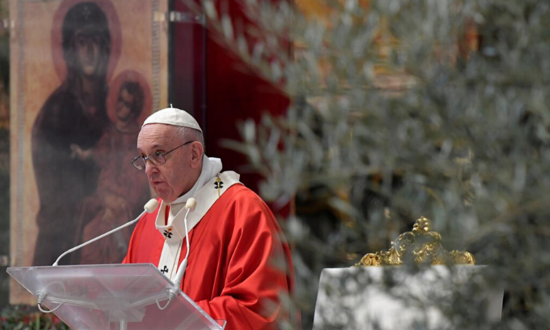 Pope Francis leads the Palm Sunday mass in St. Peter's Basilica without public participation due to the spread of Covid-19, at the Vatican on Sunday. — Reuters