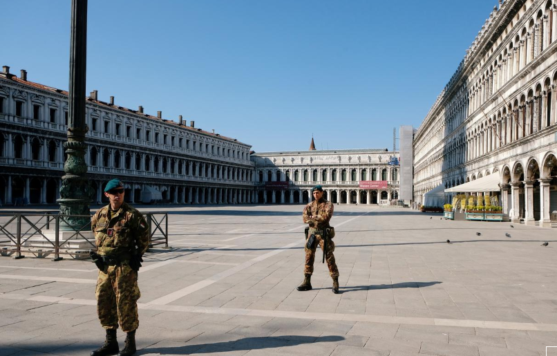 Soldiers patrol an empty Saint Mark's Square on Palm Sunday, following Covid-19 outbreak in Venice, Italy, April 5. — Reuters