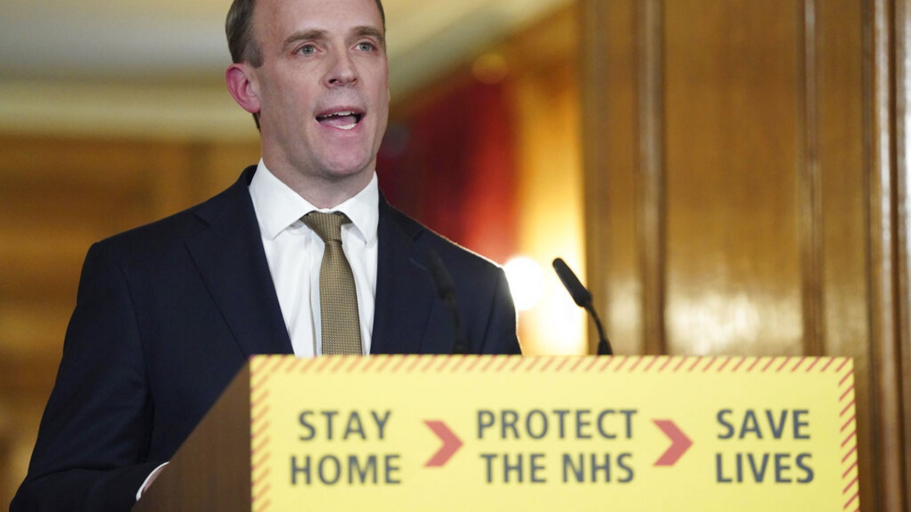 Britain's Foreign Secretary Dominic Raab answers questions from the media via a video link during a media briefing on coronavirus in Downing Street, London, on March 30. — AP