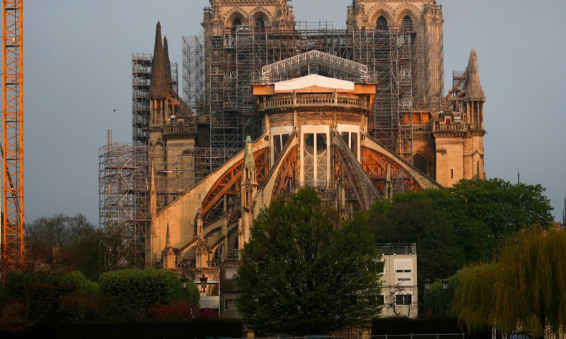 A view shows the restoration work at Notre-Dame Cathedral, which was damaged in a devastating fire almost one year ago ahead of Easter celebrations to be held under lockdown imposed to slow the spread of Covid-19 in France. &mdash; Reuters