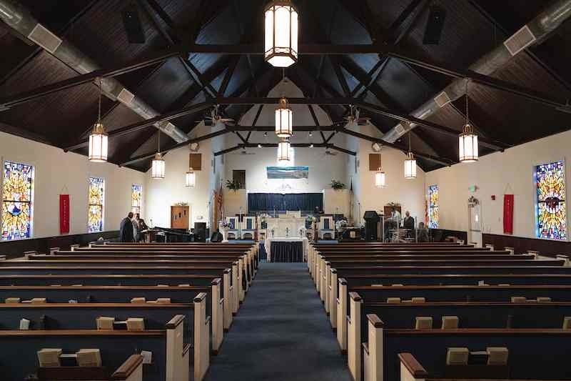 A view from inside Easter Sunday morning services at The Friendship Baptist Church on April 12, 2020 in Baltimore, Maryland. The church pastor, Alvin Gwynn, has decided to keep his church open for Easter Sunday despite an order from Maryland Governor Larry Hogan to remain closed amid the coronavirus pandemic. &mdash; AFP