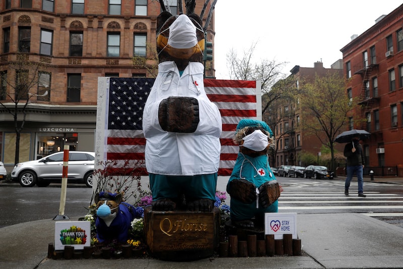 A tribute to healthcare workers and first responders is seen on a sidewalk on Manhattan's Upper West Side during the outbreak of the coronavirus disease in New York City, US, on April 13, 2020. &mdash; Reuters