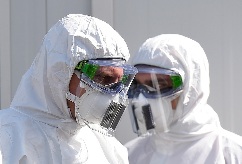 Medical employees wear protection gear with FFP3 masks and visors at a newly opened drive-in corona special test centre for Dresden public service employees such as police officers, nurses and firefighters, amid the spread of the coronavirus disease in Dresden, eastern Germany, on April 15, 2020. &mdash; Reuters