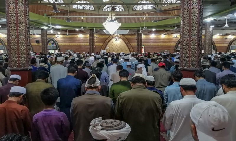 People offer Friday prayers at the Red Mosque despite a government-imposed nationwide lockdown as a preventive measure against the Covid-19, in Islamabad on April 17, 2020. &mdash; AFP