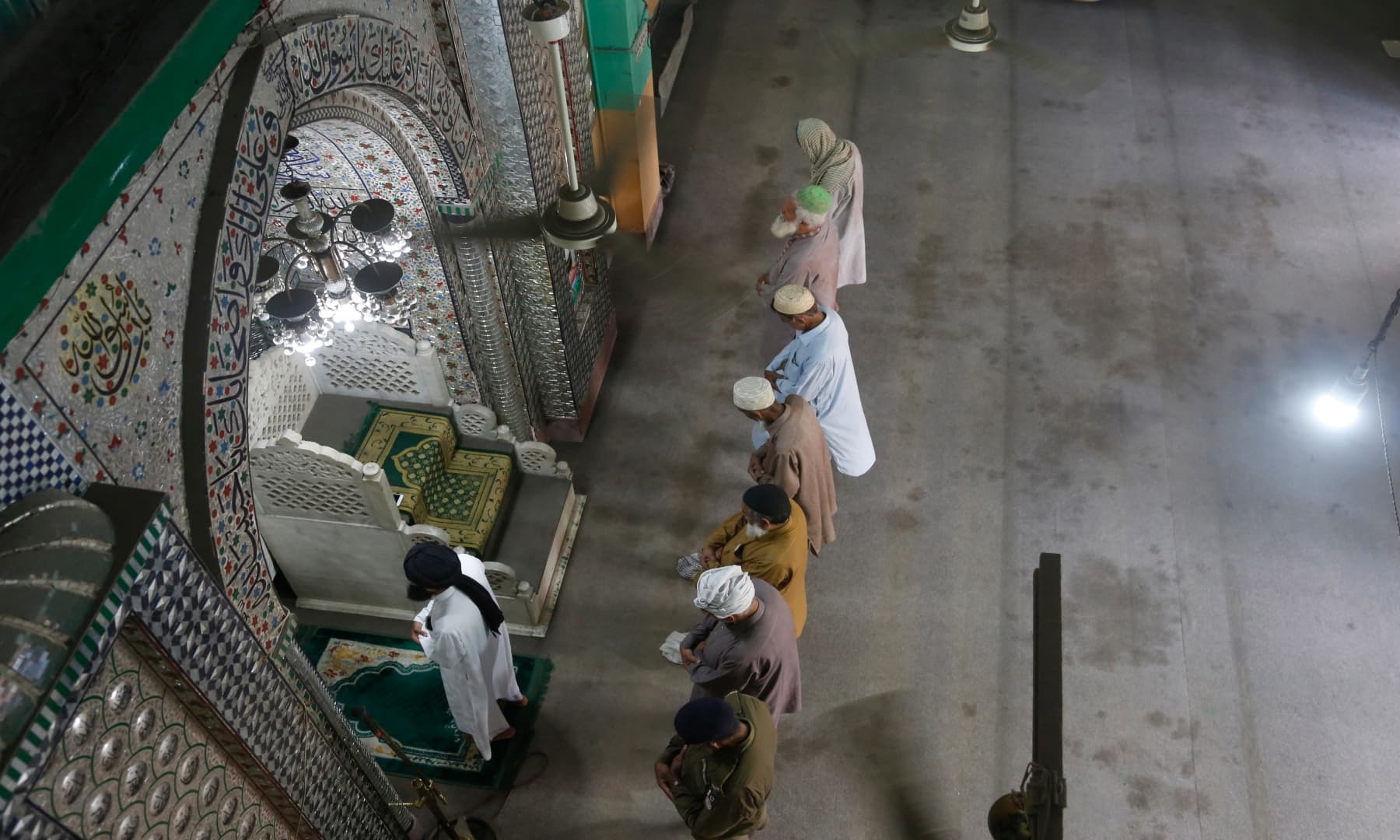 People offer Friday prayers at a mosque in Lahore. — AP