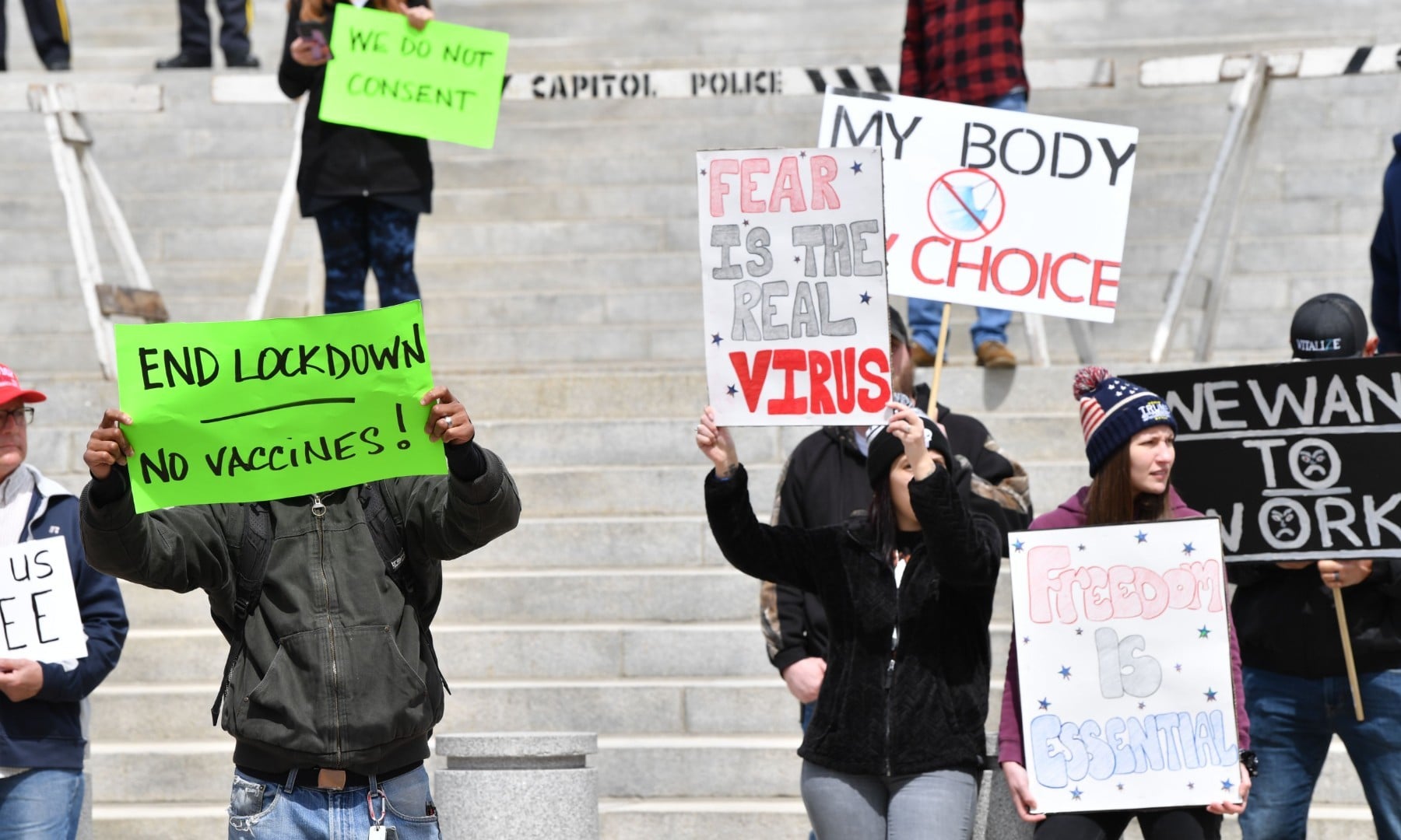 People take part in a “reopen” Pennsylvania demonstration on April 20 in Harrisburg, Pennsylvania.  — AFP