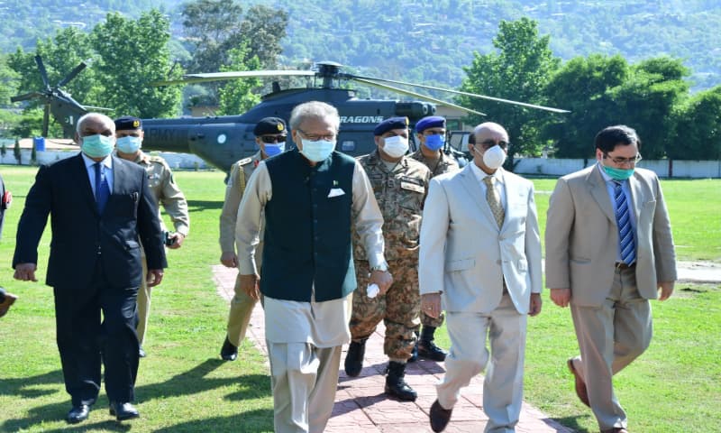 President Arif Alvi being received by President AJK Sardar Masood Khan and Prime Minister AJK Raja Farooq Haider Khan in Muzaffarabad.