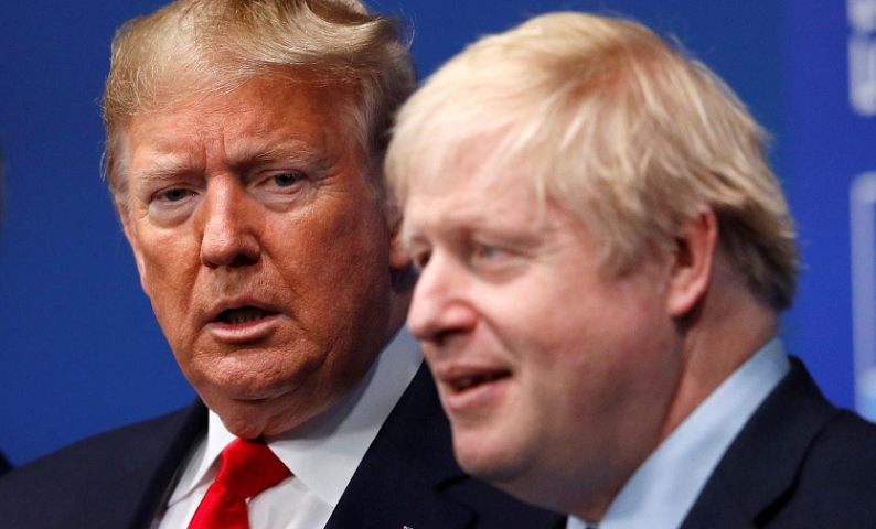 Britain's Prime Minister Boris Johnson welcomes US President Donald Trump at the NATO leaders summit in Watford, Britain, December 4, 2019. &mdash; Reuters