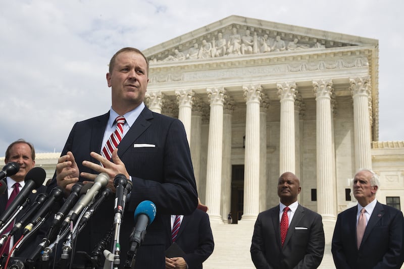 In this Sep 9, 2019, file photo, Missouri Attorney General Eric Schmitt speaks in front of the US Supreme Court in Washington. Schmitt on Tuesday, April 21, 2020, filed a lawsuit against the Chinese government, the Community Party of China and others, alleging that the hiding of information and other actions at the outset of the coronavirus outbreak led to loss of life and significant economic damage in Missouri. — AP
