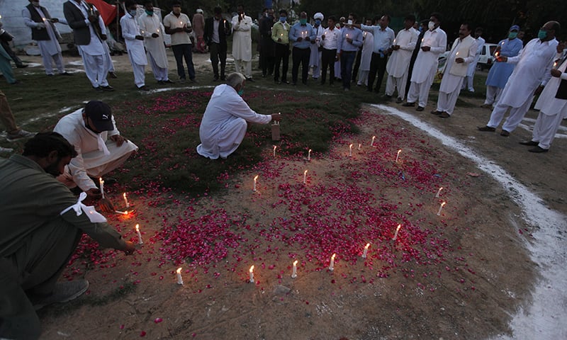 Christians supporters of the PTI hold a candlelight vigil for victims of coronavirus in Islamabad. &mdash; AP