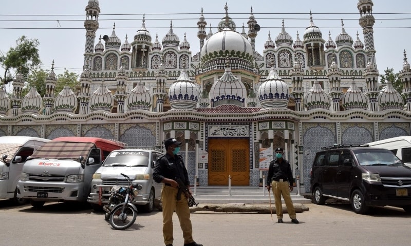 Policemen patrol the streets in Hyderabad. &mdash; Photo Umair Ali