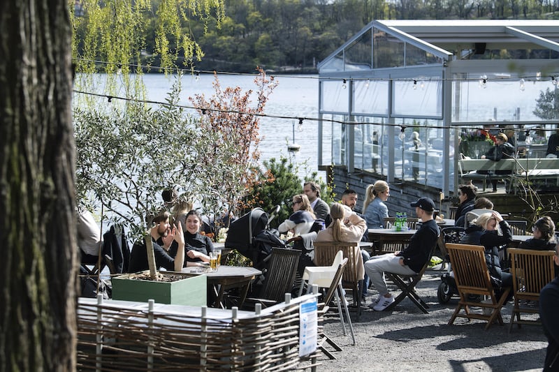 People enjoy the spring weather at an outdoor restaurant in Stockholm, Sweden April 26, 2020.
Photo: Jessica Gow / TT kod 10070
*** OUT SWEDEN  ***

&mdash; Jessica Gow