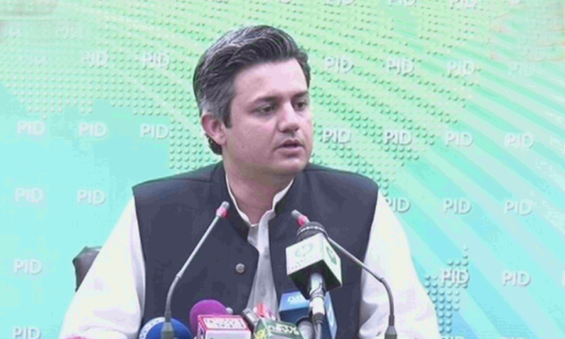 Minister for Industries Hammad Azhar speaks to the media. — DawnNewsTV