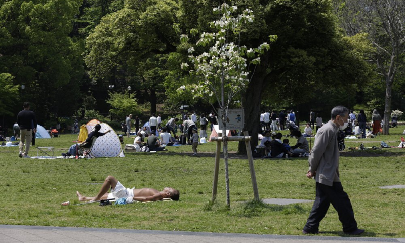 Shiba Park is packed with families with small children day camping in tents on the first day of the "Golden Week" holidays in Tokyo on Wednesday. — AP