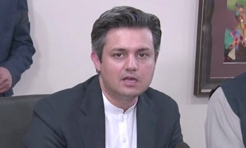 Federal Minister for Industries Hammad Azhar breifing the media. – DawnNewsTV
