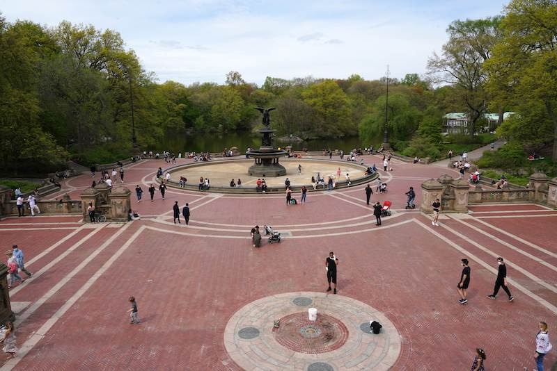 People enjoy at Bethesda Terrace and Bethesda Fountain in Central Park during the coronavirus pandemic on May 2, 2020 in New York City. — AFP