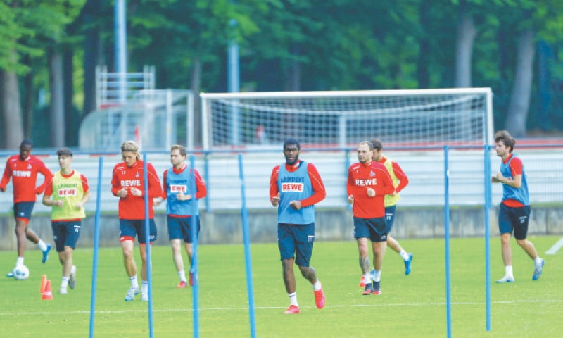 COLOGNE: Players of FC Cologne attend a training session on Monday.&mdash;Reuters