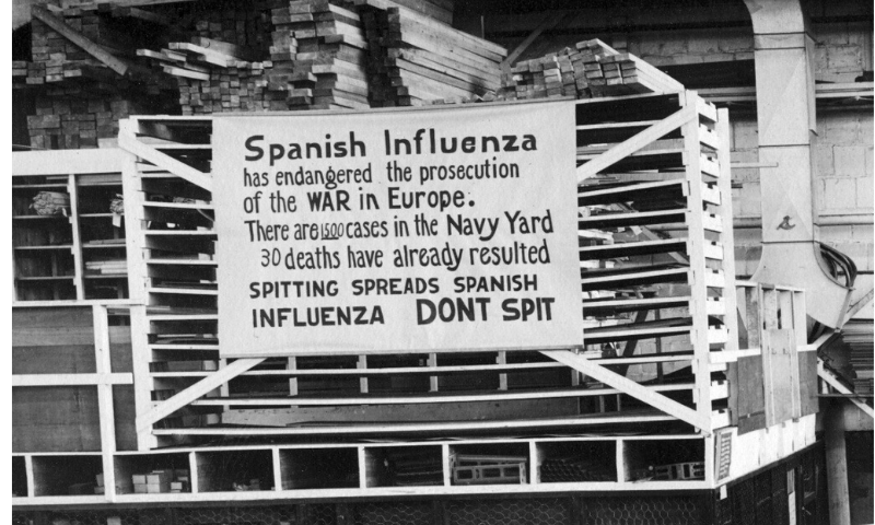 In this Oct. 19, 1918 file photo provided by the US Naval History and Heritage Command a sign is posted at the Naval Aircraft Factory in Philadelphia that indicates, the Spanish Influenza was then extremely active. — AP