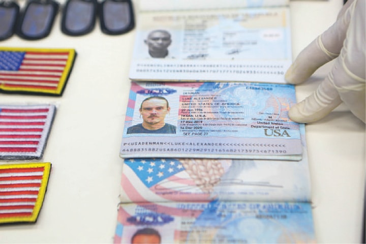 CARACAS: Personal documents are being shown by Venezuela’s President Nicolas Maduro (not pictured) during a meeting with the Bolivian armed forces on Tuesday, a day after Venezuela said it had foiled an attempted incursion by “terrorist mercenaries” from Colombia.—Reuters