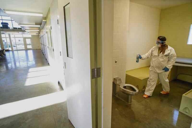 In this file photo taken on April 22, 2020, an inmate cleans a jail cell at Las Colinas Women's Detention Facility in Santee, California. — AFP