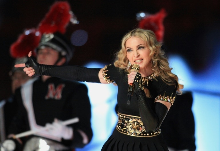 Madonna said both she and many of her cast of singers and dancers were ill. — AFP
